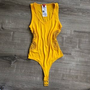 Yellow GUESS body suit